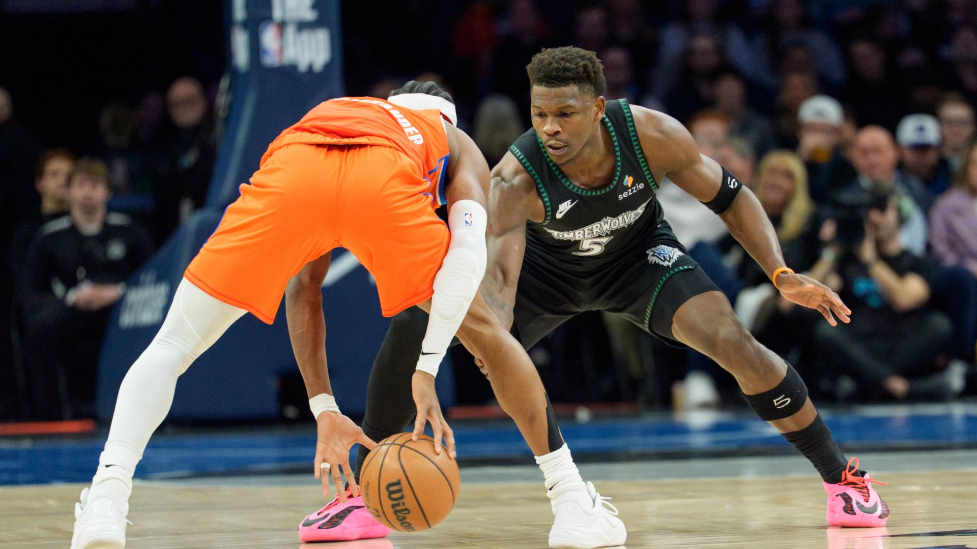 Jan 29, 2026; Minneapolis, Minnesota, USA; Minnesota Timberwolves guard Anthony Edwards (5) defends Oklahoma City Thunder guard Shai Gilgeous-Alexander (2) in the first quarter at Target Center