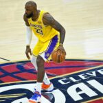 Jan 28, 2026; Cleveland, Ohio, USA; Los Angeles Lakers forward LeBron James (23) brings the ball up court in the fourth quarter against the Cleveland Cavaliers at Rocket Arena.