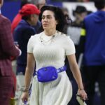 Indianapolis Colts owner Carlie Irsay-Gordon walks off the field at halftime of the game against the San Francisco 49ers at Lucas Oil Stadium.