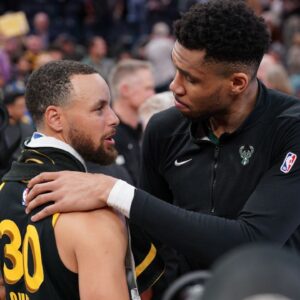 Milwaukee Bucks forward Giannis Antetokounmpo (34) and Golden State Warriors guard Stephen Curry (30) meet after the game at the Chase Center