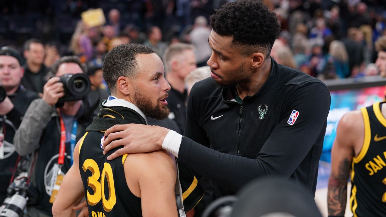Milwaukee Bucks forward Giannis Antetokounmpo (34) and Golden State Warriors guard Stephen Curry (30) meet after the game at the Chase Center