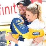 Apr 23, 2016; Richmond, VA, USA; Xfinity Series driver Dale Earnhardt Jr. (88) celebrates with his fianc Amy Reimann in Victory Lane after winning the Toyotacare 250 at Richmond International Raceway.