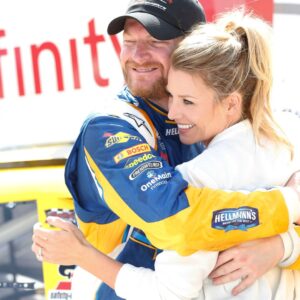 Apr 23, 2016; Richmond, VA, USA; Xfinity Series driver Dale Earnhardt Jr. (88) celebrates with his fianc Amy Reimann in Victory Lane after winning the Toyotacare 250 at Richmond International Raceway.