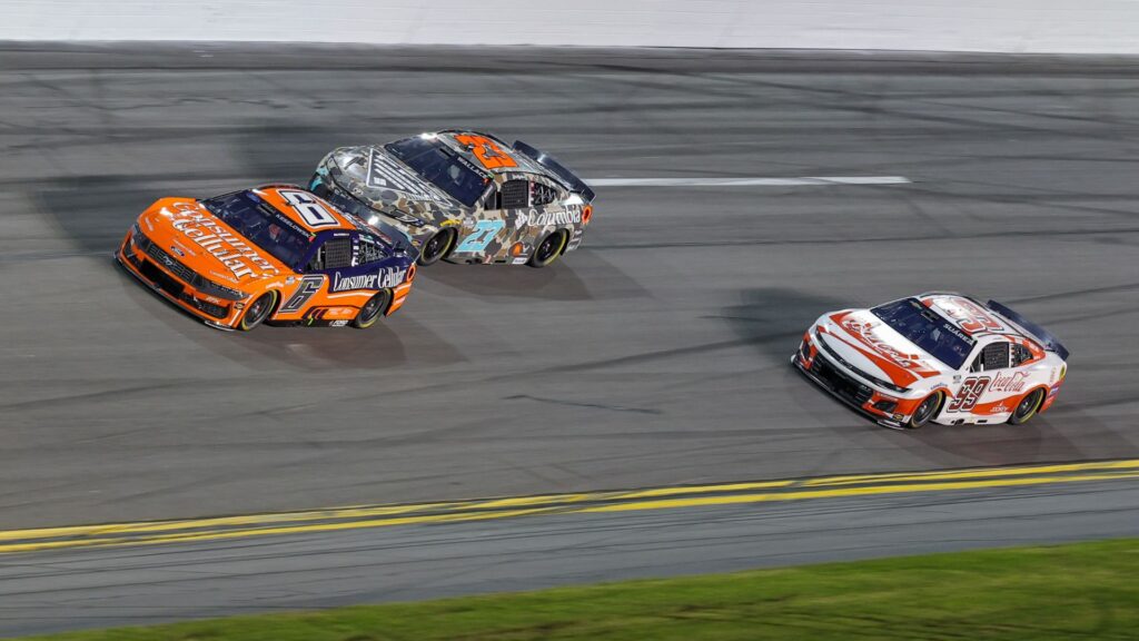 Aug 23, 2025; Daytona Beach, Florida, USA; NASCAR drivers race during the Coke Zero Sugar 400 at Daytona International Speedway.