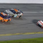 Aug 23, 2025; Daytona Beach, Florida, USA; NASCAR drivers race during the Coke Zero Sugar 400 at Daytona International Speedway.