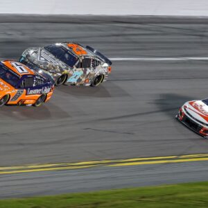 Aug 23, 2025; Daytona Beach, Florida, USA; NASCAR drivers race during the Coke Zero Sugar 400 at Daytona International Speedway.