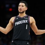 Phoenix Suns guard Devin Booker (1) reacts against the Oklahoma City Thunder in the first half at Mortgage Matchup Center