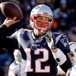 New England Patriots quarterback Tom Brady (12) throws against the New York Jets during the first half at Gillette Stadium.