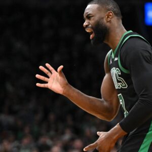 Jan 10, 2026; Boston, Massachusetts, USA; Boston Celtics guard Jaylen Brown (7) reacts after a non-call against the San Antonio Spurs during the second half at the TD Garden.
