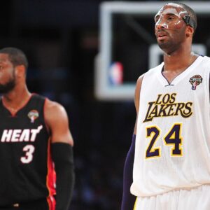 March 4, 2012; Los Angeles, CA, USA; Los Angeles Lakers shooting guard Kobe Bryant (24) and Miami Heat shooting guard Dwyane Wade (3) during a stoppage in play in the first half at Staples Center