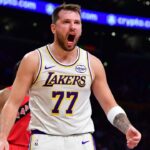 Los Angeles Lakers guard Luka Doncic (77) reacts during the first half at Crypto.com Arena