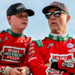 Former NASCAR Cup Series champion Kevin Harvick, center, right, and his son Keelan, 13, look on before the two raced in the 13th annual Masters of the Pros 200 race on Wednesday, July 16, 2025, at the Owosso Speedway.