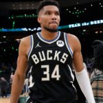 Jan 23, 2026; Milwaukee, Wisconsin, USA; Milwaukee Bucks forward Giannis Antetokounmpo (34) walks from the court following the game against the Denver Nuggets at Fiserv Forum.
