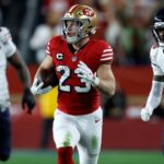 San Francisco 49ers running back Christian McCaffrey (23) runs against Chicago Bears cornerback Nahshon Wright (26) in the first half at Levi's Stadium.