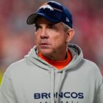 Denver Broncos head coach Sean Payton takes the field prior to a game against the Kansas City Chiefs at GEHA Field at Arrowhead Stadium.