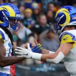 London, United Kingdom; Los Angeles Rams wide receiver Davante Adams (17) celebrates with quarterback Matthew Stafford (9) after scoring a touchdown against the Jacksonville Jaguars during the first half during a NFL International Series game at Wembley Stadium.