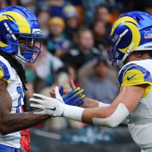 London, United Kingdom; Los Angeles Rams wide receiver Davante Adams (17) celebrates with quarterback Matthew Stafford (9) after scoring a touchdown against the Jacksonville Jaguars during the first half during a NFL International Series game at Wembley Stadium.