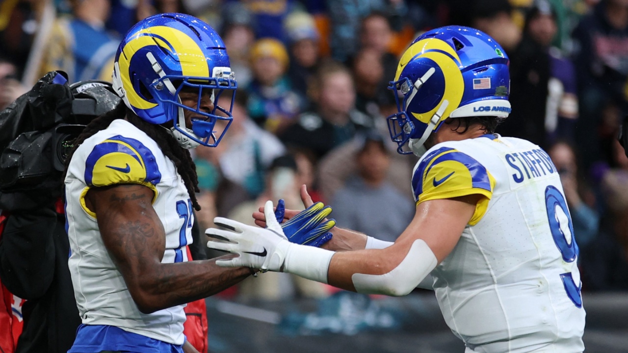 London, United Kingdom; Los Angeles Rams wide receiver Davante Adams (17) celebrates with quarterback Matthew Stafford (9) after scoring a touchdown against the Jacksonville Jaguars during the first half during a NFL International Series game at Wembley Stadium.