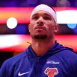 Jan 24, 2026; Philadelphia, Pennsylvania, USA; New York Knicks guard Josh Hart stands for the anthem before action against the Philadelphia 76ers at Xfinity Mobile Arena.