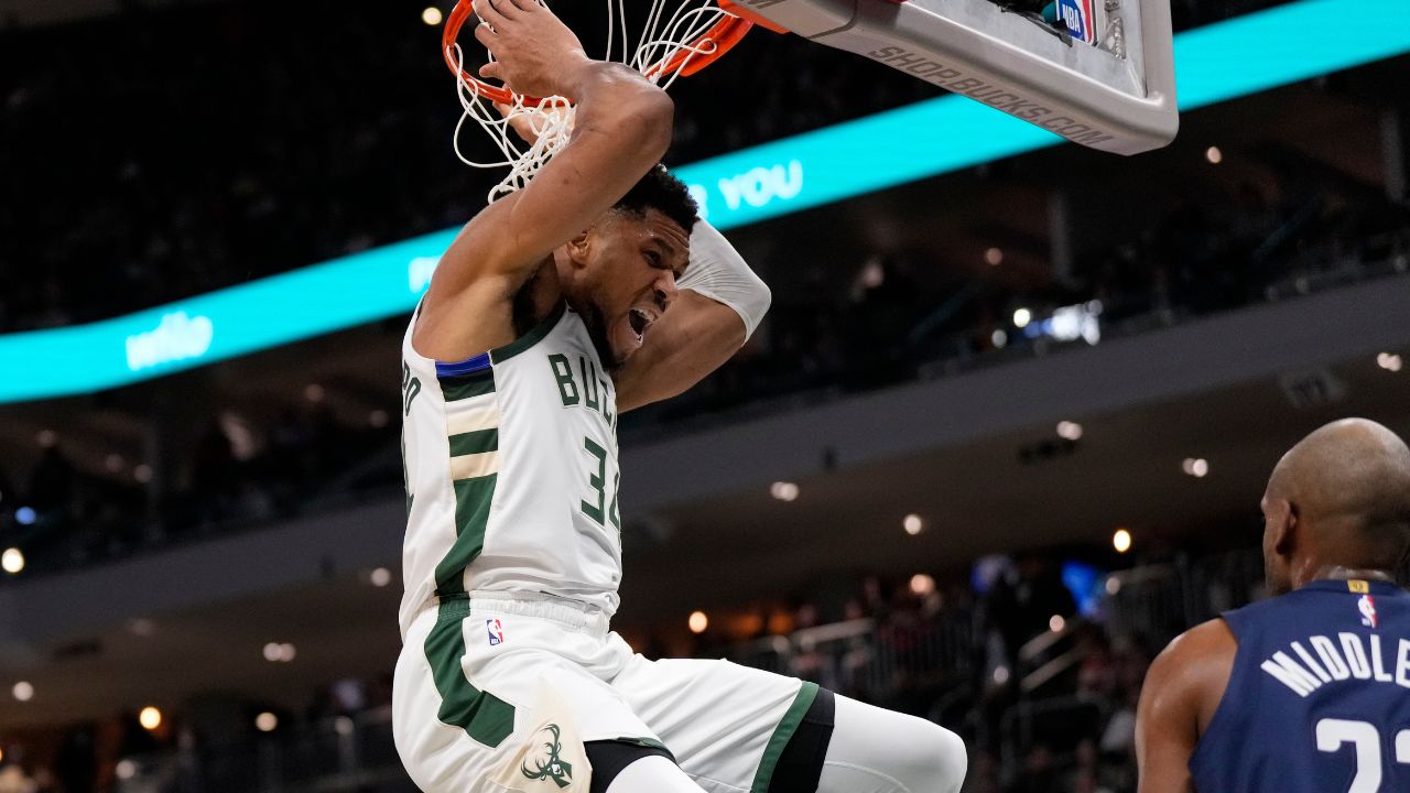 Milwaukee Bucks forward Giannis Antetokounmpo (34) reacts following a dunk during the first quarter against the Washington Wizards at Fiserv Forum