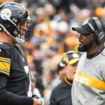 Pittsburgh Steelers head coach Mike Tomlin talks with quarterback Ben Roethlisberger (7) during the second quarter against the Cleveland Browns at Heinz Field.