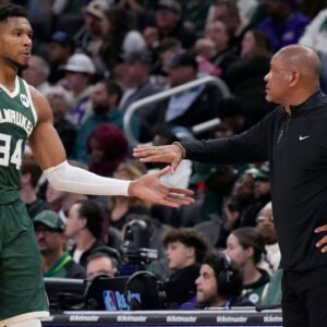 Oct 25, 2024; Milwaukee, Wisconsin, USA; Milwaukee Bucks head coach Doc Rivers takes Milwaukee Bucks forward Giannis Antetokounmpo (34) out of the game in the fourth quarter against the Chicago Bulls at Fiserv Forum