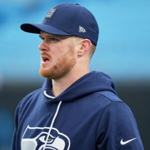 Seattle Seahawks quarterback Sam Darnold (14) looks on during warmups before the game against the Carolina Panthers at Bank of America Stadium.