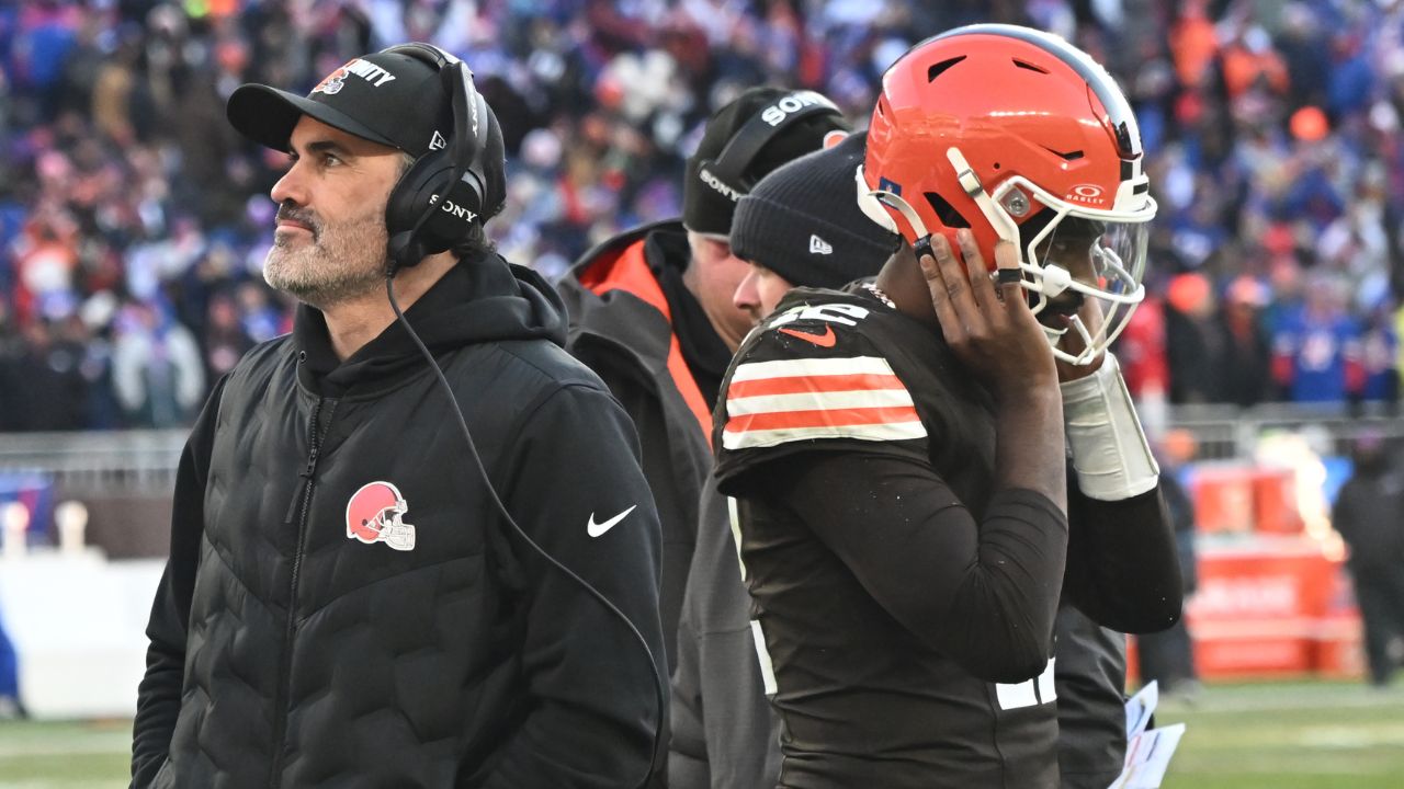 Cleveland Browns head coach Kevin Stefanski and quarterback Shedeur Sanders (12) on the sidelines against the Buffalo Bills during the second half at Huntington Bank Field.