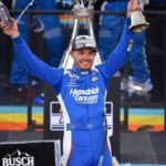 Nov 2, 2025; Avondale, Arizona, USA; NASCAR Cup Series driver Kyle Larson (5) celebrates his championship victory following the Cup Series Championship race at Phoenix Raceway