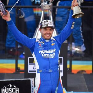 Nov 2, 2025; Avondale, Arizona, USA; NASCAR Cup Series driver Kyle Larson (5) celebrates his championship victory following the Cup Series Championship race at Phoenix Raceway