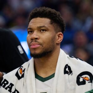 Milwaukee Bucks forward Giannis Antetokounmpo (34) looks on from the bench against the Golden State Warriors during the second quarter at Chase Center.