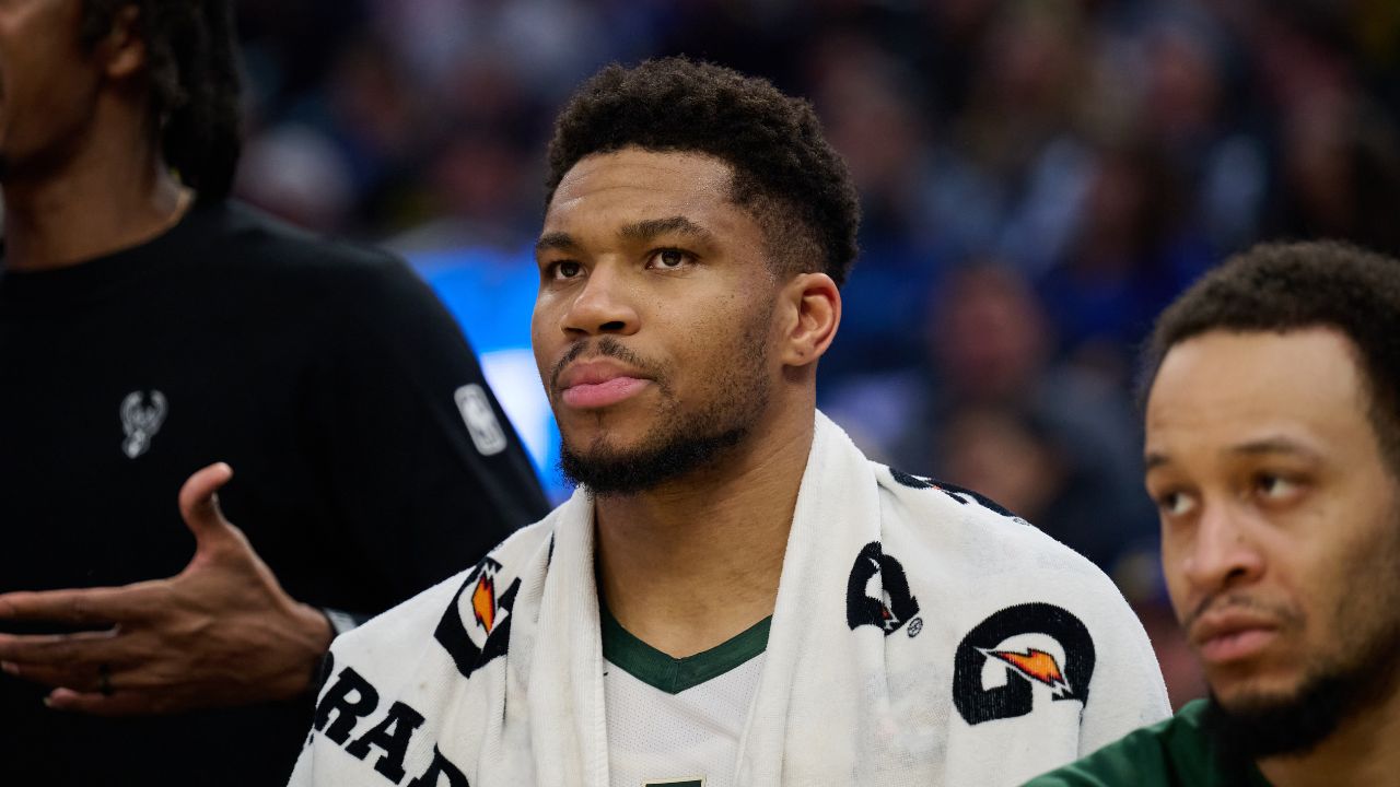 Milwaukee Bucks forward Giannis Antetokounmpo (34) looks on from the bench against the Golden State Warriors during the second quarter at Chase Center.