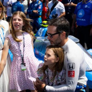 May 29, 2022; Indianapolis, Indiana, USA; IndyCar Series driver Jimmie Johnson with wife Chandra Johnson and their daughters prior to the running of the 106th Indianapolis 500 at Indianapolis Motor Speedway