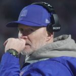 Buffalo Bills head coach Sean McDermott talks to one of the assistant coaches during second half action against the Philadelphia Eagles at Highmark Stadium in Orchard Park on Dec. 28, 2025.