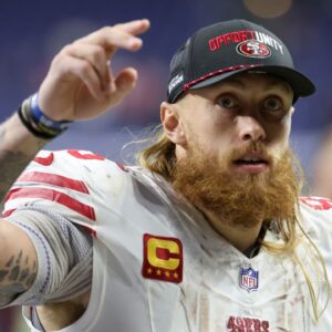 San Francisco 49ers tight end George Kittle (85) leaves the field after the game against the Indianapolis Colts at Lucas Oil Stadium.