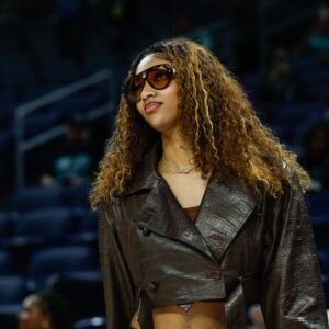 Sep 11, 2025; Chicago, Illinois, USA; Injured Chicago Sky forward Angel Reese (5) stands on the sidelines before a WNBA game against the New York Liberty at Wintrust Arena.