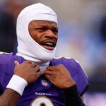 Baltimore Ravens quarterback Lamar Jackson (8) looks on during warmups before the game between the Pittsburgh Steelers and Baltimore Ravens at M&T Bank Stadium.
