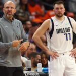 Oct 26, 2024; Phoenix, Arizona, USA; Dallas Mavericks head coach Jason Kidd with guard Luka Doncic (77) against the Phoenix Suns in the first half at Footprint Center