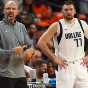 Oct 26, 2024; Phoenix, Arizona, USA; Dallas Mavericks head coach Jason Kidd with guard Luka Doncic (77) against the Phoenix Suns in the first half at Footprint Center