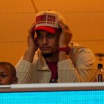 Patrick Mahomes watches the action from a suite during the third quarter at GEHA Field at Arrowhead Stadium.