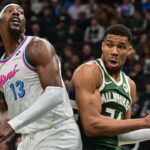 Milwaukee Bucks forward Giannis Antetokounmpo (34) looks for a shot against Miami Heat center Bam Adebayo (13) in the second quarter at Fiserv Forum.