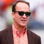 Peyton Manning looks on before the game between the Denver Broncos and New York Giants at Empower Field at Mile High.