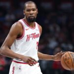 Houston Rockets forward Kevin Durant (7) controls the ball during the first quarter against the Dallas Mavericks at American Airlines Center.