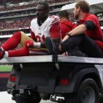 San Francisco 49ers defensive tackle Sam Okuayinonu (91) is driven in a cart after an apparent injury during the fourth quarter against the Houston Texans at NRG Stadium.