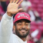 San Francisco 49ers middle linebacker Fred Warner (54) waves prior to the game against the Atlanta Falcons at Levi's Stadium.