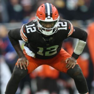 Cleveland Browns quarterback Shedeur Sanders (12) stretches during a time out in the fourth quarter against the Pittsburgh Steelers at Huntington Bank Field.