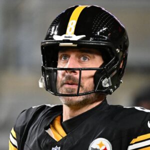 Pittsburgh Steelers quarterback Aaron Rodgers (8) warms up before an AFC Wild Card Round game against the Houston Texans at Acrisure Stadium.