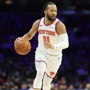 Jan 24, 2026; Philadelphia, Pennsylvania, USA; New York Knicks guard Jalen Brunson (11) dribbles the ball against the Philadelphia 76ers during the first quarter at Xfinity Mobile Arena.