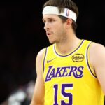 Dec 23, 2025; Phoenix, Arizona, USA; Los Angeles Lakers guard Austin Reaves (15) against the Phoenix Suns at Mortgage Matchup Center.