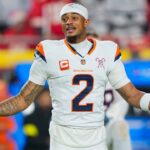 Denver Broncos cornerback Pat Surtain II (2) warms up prior to a game against the Kansas City Chiefs at GEHA Field at Arrowhead Stadium.